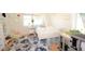 Bright bedroom features a canopy bed, floral rug, and plenty of decor at 5273 Potomac St, North Charleston, SC 29405