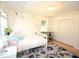Bright bedroom with a white bed frame, floral rug, and large closet, creating a cozy and inviting space at 5273 Potomac St, North Charleston, SC 29405