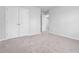 Bedroom featuring double closets, neutral paint tones, and plush carpeting at 573 Yellow Leaf Ln, Summerville, SC 29486