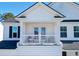 Charming home exterior with a covered porch that offers beautiful views at 573 Yellow Leaf Ln, Summerville, SC 29486
