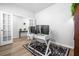 Bright and airy office with modern desk setup, stylish rug, and ample natural light at 573 Yellow Leaf Ln, Summerville, SC 29486