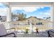 Inviting front porch featuring comfortable seating and a picturesque view of the neighborhood at 573 Yellow Leaf Ln, Summerville, SC 29486