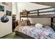 Comfortable bedroom featuring a bunk bed with storage, and bright, coastal décor at 601 Magnolia Ln, Edisto Island, SC 29438