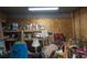 Organized storage area with shelves holding household supplies and bicycles, maximizing space at 601 Magnolia Ln, Edisto Island, SC 29438