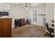 Neutral bedroom featuring a ceiling fan and window for lots of natural light and a neutral carpet at 680 Kent St, Mount Pleasant, SC 29464