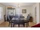 Formal dining room with elegant chandelier and plenty of room for entertaining at 680 Kent St, Mount Pleasant, SC 29464