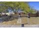 Charming home featuring a brick fence, mature shade tree, and inviting walkway at 680 Kent St, Mount Pleasant, SC 29464