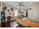 Bedroom with hardwood floors, ceiling fan, and natural light at 757 King St, Charleston, SC 29403