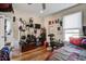 Bedroom featuring hardwood floors, ceiling fan, and window at 757 King St, Charleston, SC 29403