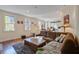 Open-concept living room with hardwood floors and lots of natural light at 757 King St, Charleston, SC 29403