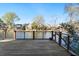 Relaxing view of the waterfront homes from the back deck; perfect for outdoor entertaining at 777 Lake Frances Dr, Charleston, SC 29412