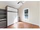 Bedroom with a vaulted ceiling, hardwood floors, a Murphy bed and bright natural light at 777 Lake Frances Dr, Charleston, SC 29412