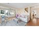 Bright living room with hardwood floors and large windows, perfect for relaxation and entertainment at 777 Lake Frances Dr, Charleston, SC 29412
