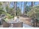 Backyard featuring an outdoor table and seating, and a landscaped stone path at 8 Townpark Ln # B, Charleston, SC 29412
