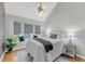 Bright bedroom featuring a bay window, ceiling fan and hardwood floors at 8 Townpark Ln # B, Charleston, SC 29412