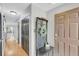 Welcoming foyer featuring hardwood floors and neutral gray wall paint at 8 Townpark Ln # B, Charleston, SC 29412