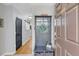 Welcoming foyer featuring hardwood floors and a decorative antique hall tree at 8 Townpark Ln # B, Charleston, SC 29412