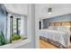 Well-lit main bedroom includes private access to an outdoor balcony at 8 Townpark Ln # B, Charleston, SC 29412