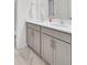 Bathroom featuring double sink vanity, grey cabinets, and marble tile floors at 808 S Pointe Blvd, Summerville, SC 29483
