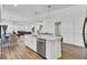 Bright and airy kitchen featuring a center island, stainless steel dishwasher, and hardwood flooring at 808 S Pointe Blvd, Summerville, SC 29483