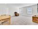 Spacious living room with plush carpeting, abundant natural light, and comfortable seating at 808 S Pointe Blvd, Summerville, SC 29483