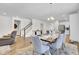 Cozy living space with a dining area, a kitchen, and a staircase at 808 S Pointe Blvd, Summerville, SC 29483