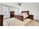 Spacious main bedroom with hardwood floors, a ceiling fan, and large windows for natural light at 808 S Pointe Blvd, Summerville, SC 29483