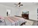 Bright main bedroom with a ceiling fan, a large dresser, a walk-in closet, and hardwood floors at 808 S Pointe Blvd, Summerville, SC 29483