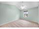 A light and airy bedroom with neutral walls, carpet and a large window providing lots of light at 8618 Grassy Oak Trl, North Charleston, SC 29420