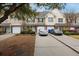 Attractive townhomes featuring garages, well-maintained landscaping, and inviting curb appeal at 8618 Grassy Oak Trl, North Charleston, SC 29420