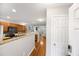 Open-concept kitchen flowing into living space, with granite countertops and stainless appliances at 8618 Grassy Oak Trl, North Charleston, SC 29420