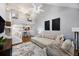 Bright living room with high ceilings, open floor plan and cozy sectional sofa at 8618 Grassy Oak Trl, North Charleston, SC 29420