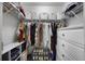Organized walk-in closet with shelving, hanging rods, drawers, and ample storage space at 8618 Grassy Oak Trl, North Charleston, SC 29420