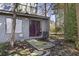 Back patio with sliding glass doors, a small window, and a charcoal grill in a home with vinyl siding at 9 Stallion Ct, Charleston, SC 29407
