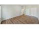 Bedroom featuring hardwood floors, closet doors and access to other rooms at 9 Stallion Ct, Charleston, SC 29407