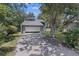Exterior view of a two-story house with garage and shaded driveway at 9 Stallion Ct, Charleston, SC 29407