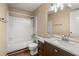 The bathroom features a shower and tub, white sink, and dark wood vanity for contrast at 100 Traders Station Rd, Summerville, SC 29486