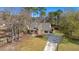 Charming single-Gathering home with a well-maintained lawn and inviting entrance at 100 Traders Station Rd, Summerville, SC 29486