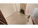 Elevated view of a cozy living room with a stone fireplace and tile flooring at 100 Traders Station Rd, Summerville, SC 29486