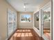 A bonus room with laminate flooring and a view of the front yard at 100 Traders Station Rd, Summerville, SC 29486