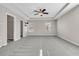 Large bedroom featuring a tray ceiling, ceiling fan, and view to ensuite at 105 Endicott Ct, Summerville, SC 29486
