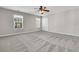 Comfortable bedroom featuring neutral walls, plush carpet, and a large window at 105 Endicott Ct, Summerville, SC 29486