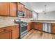 Well-equipped kitchen boasts granite countertops, stainless steel appliances, and ample cabinet space at 105 Endicott Ct, Summerville, SC 29486