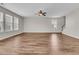 Living room featuring hardwood floors, ceiling fan, and multiple windows at 105 Endicott Ct, Summerville, SC 29486