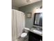 Cozy bathroom features a shower and a granite vanity at 106 Shirley Dr, Ladson, SC 29456