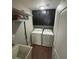 Practical laundry room with cabinets, a utility sink, and washer/dryer at 106 Shirley Dr, Ladson, SC 29456