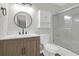 Modern bathroom featuring new vanity, updated lighting, and glass-enclosed shower at 1142 Village Creek Ln # 3, Mount Pleasant, SC 29464