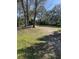 Tranquil common area featuring lush green spaces, shady mature trees, and peaceful picnic area at 1142 Village Creek Ln # 3, Mount Pleasant, SC 29464