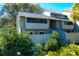 Inviting two-story condo featuring mature landscaping and a screened-in porch at 1142 Village Creek Ln # 3, Mount Pleasant, SC 29464