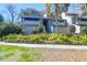 Charming two-story condo with mature trees and landscaping provides great curb appeal at 1142 Village Creek Ln # 3, Mount Pleasant, SC 29464